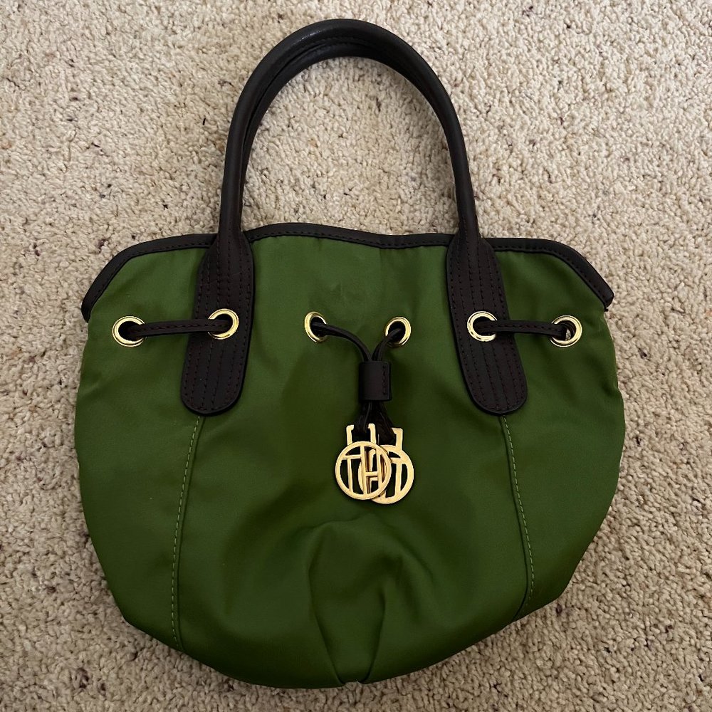 Tommy Hilfiger green bag with brown faux leather straps and gold accents